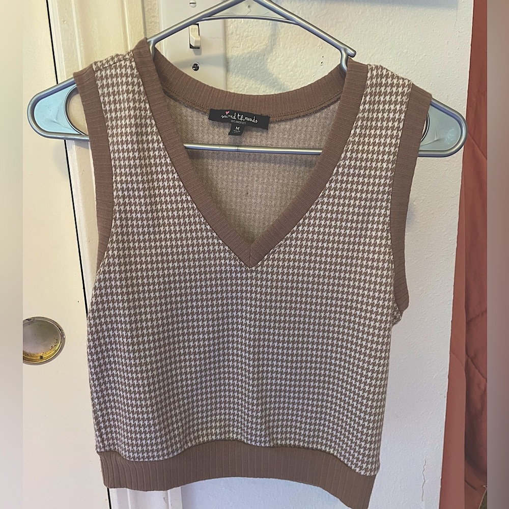 Brown little vest